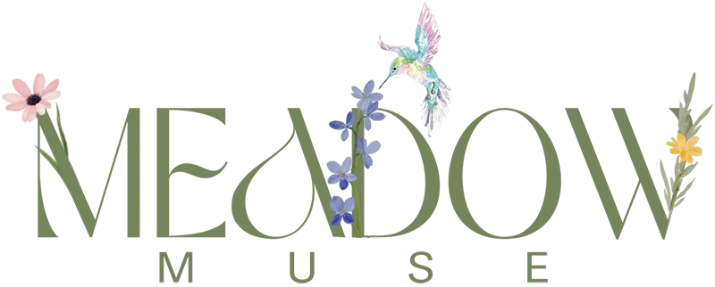 Meadow Muse written in green with floral accents