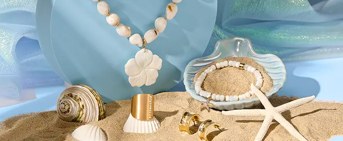 Beach themed flat lay shot of jewelry